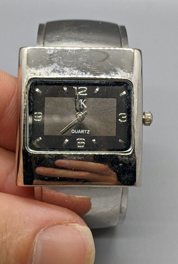 Unbranded Fashion Bangle Wrist Watch - Silver Tone Bracelet - Black Dial