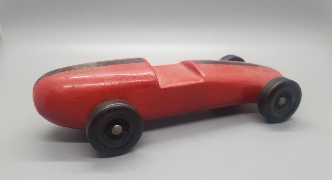Carved Wooden Race Car - Painted Red with Black Stripe