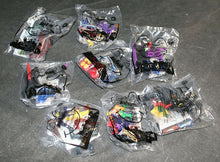Load image into Gallery viewer, 8 McDonald&#39;s BATMAN Happy Meal Toys - Sealed In Packages
