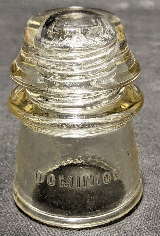 Vintage Dominion - 16 Glass Telegraph Insulator