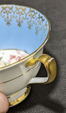 Load image into Gallery viewer, Royal Albert Bone China Teacup &amp; Saucer - Teal with Center Roses
